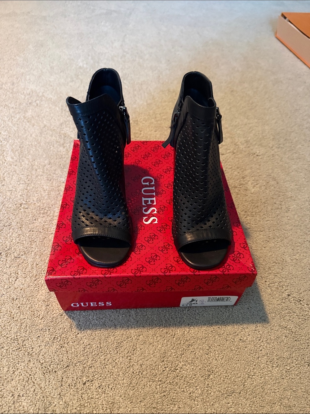 GUESS Black Perforated Peep-Toe Booties with Side Zip. Worn one time.